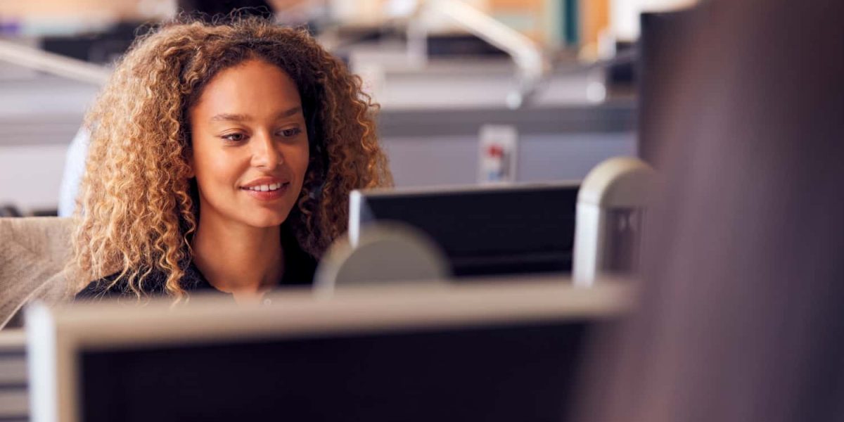 young-businesswoman-wearing-telephone-headset-talk-2021-08-27-09-44-02-utc-min.jpg